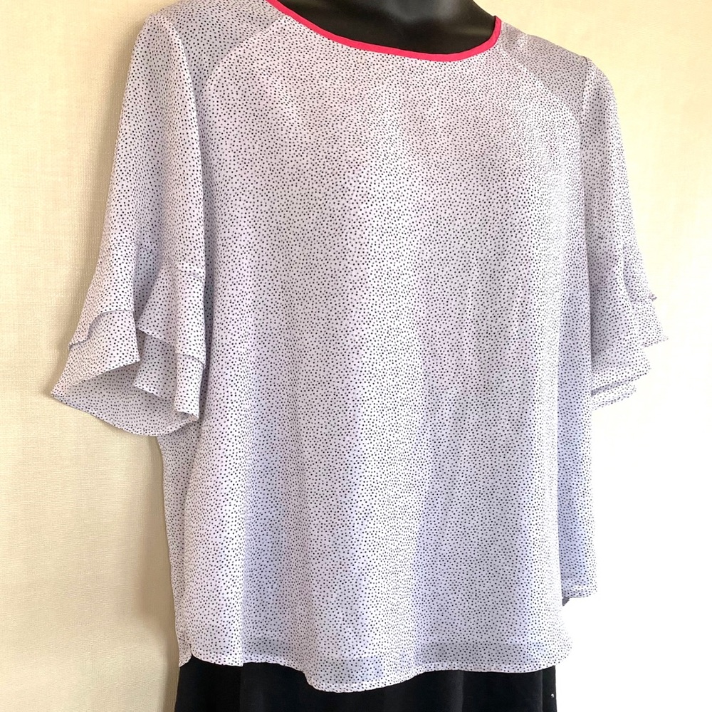 Layered white blouse with tiny polka dots.